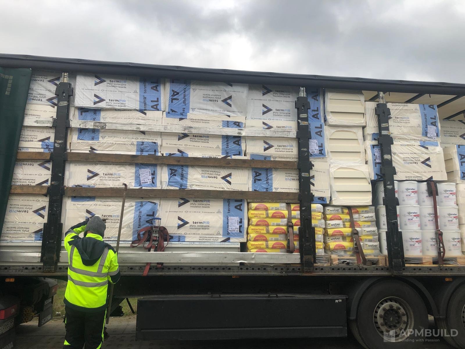 Polish lorry loaded with PIR insulation boards and render system bags delivered to APMBuild Herefordshire site
