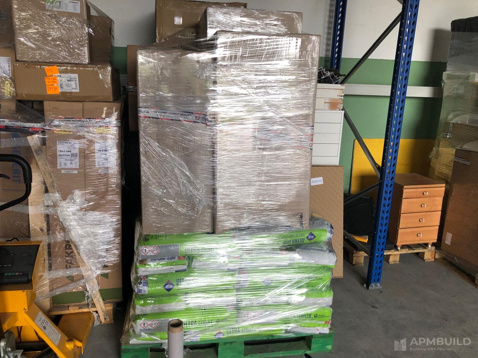 Pallets of insulation, sanitaryware and adhesives consolidated in Poland, ready for APMBuild Herefordshire delivery